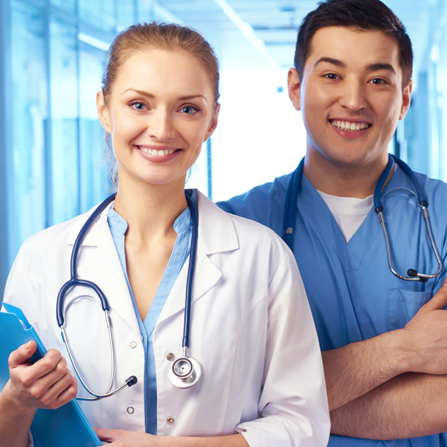 Inspire Academic Consultancy — nurse and doctor reviewing exam prep materials